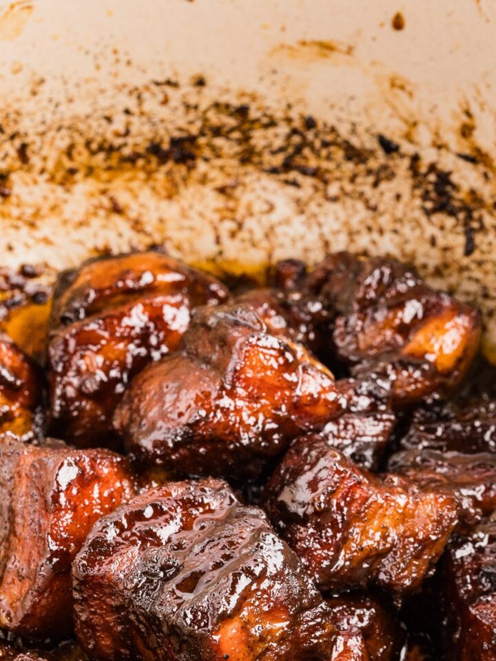 Pork belly burnt ends in a cast iron Dutch oven
