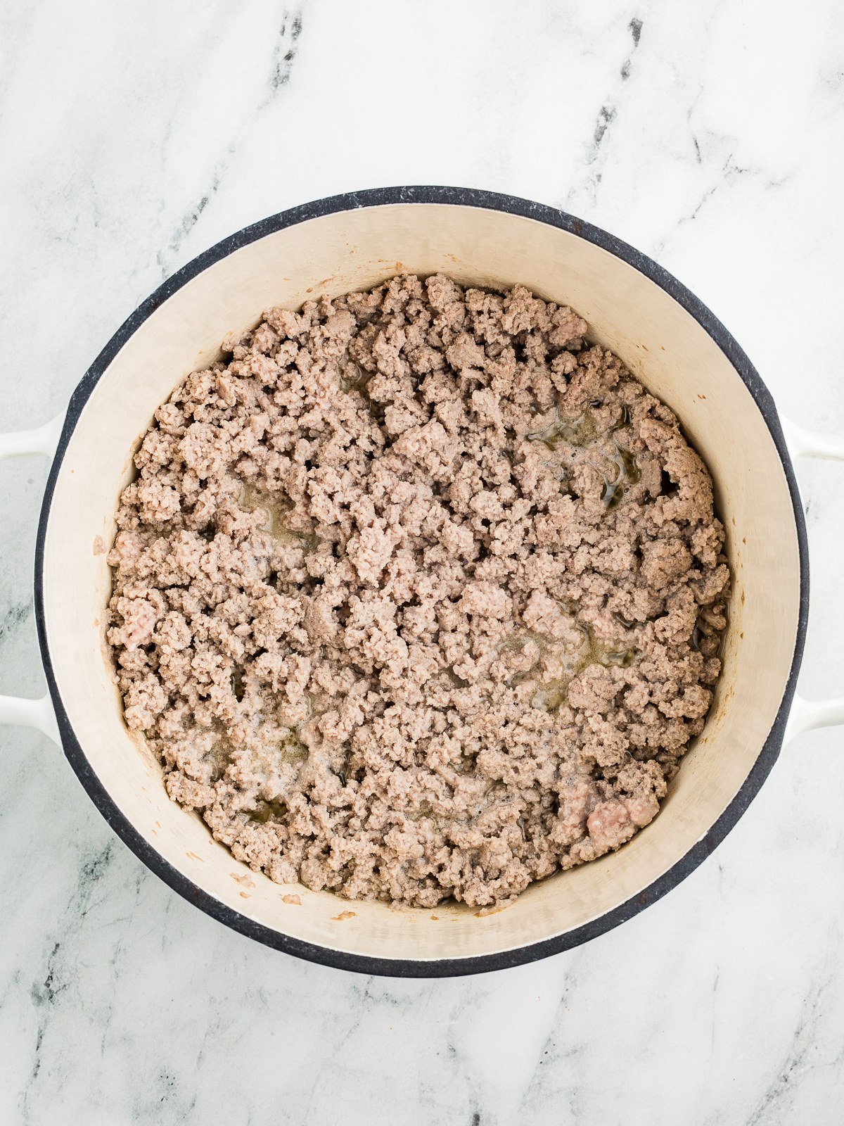 Browning ground turkey in a Dutch oven