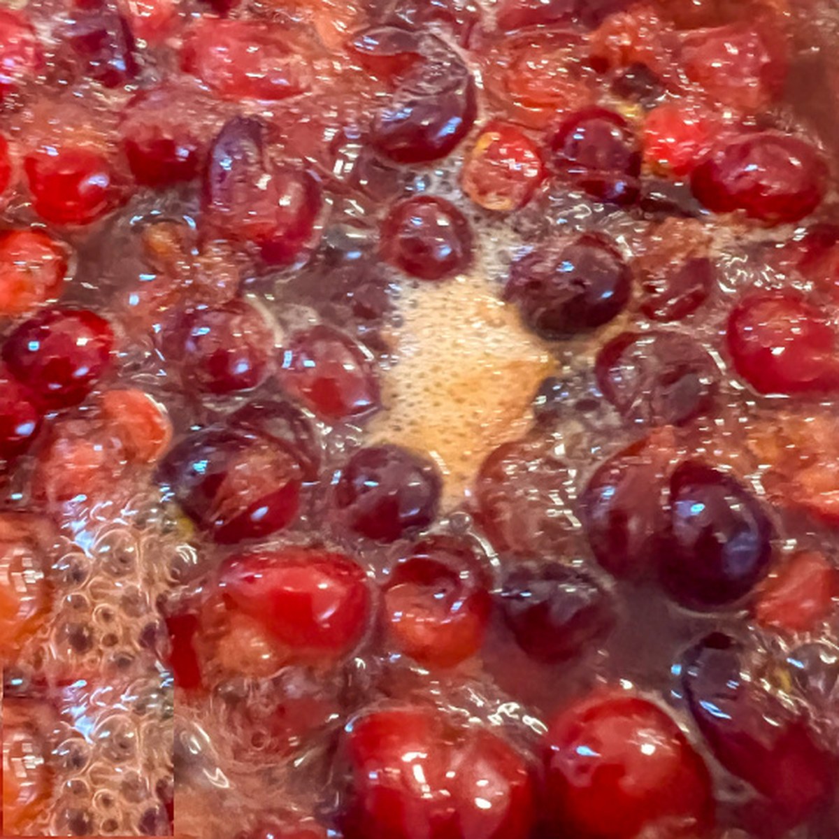 Cranberry sauce boiling and starting to reduce and thicken.