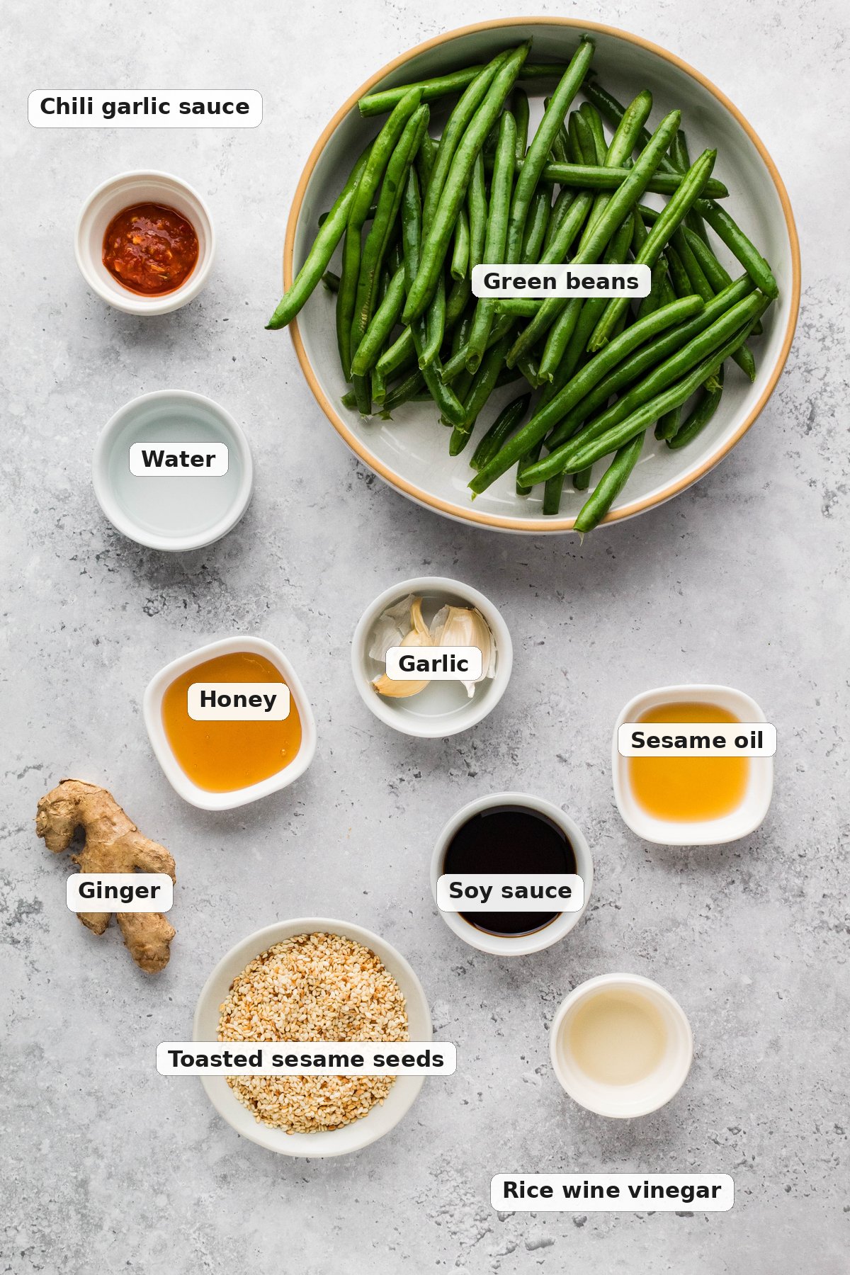 Labeled ingredients for Asian green beans including green beans, soy sauce, honey, garlic, and ginger