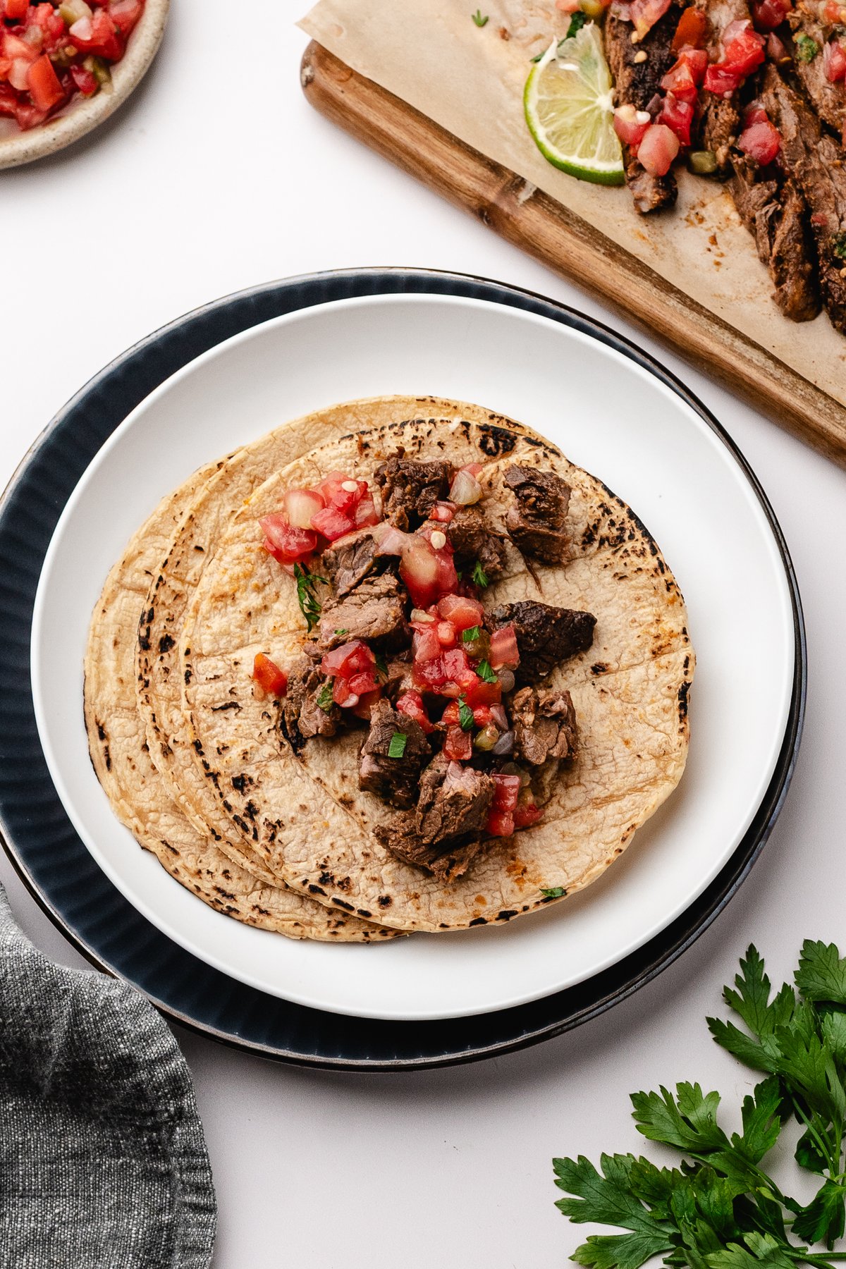 Marinated steak tacos on warm tortillas