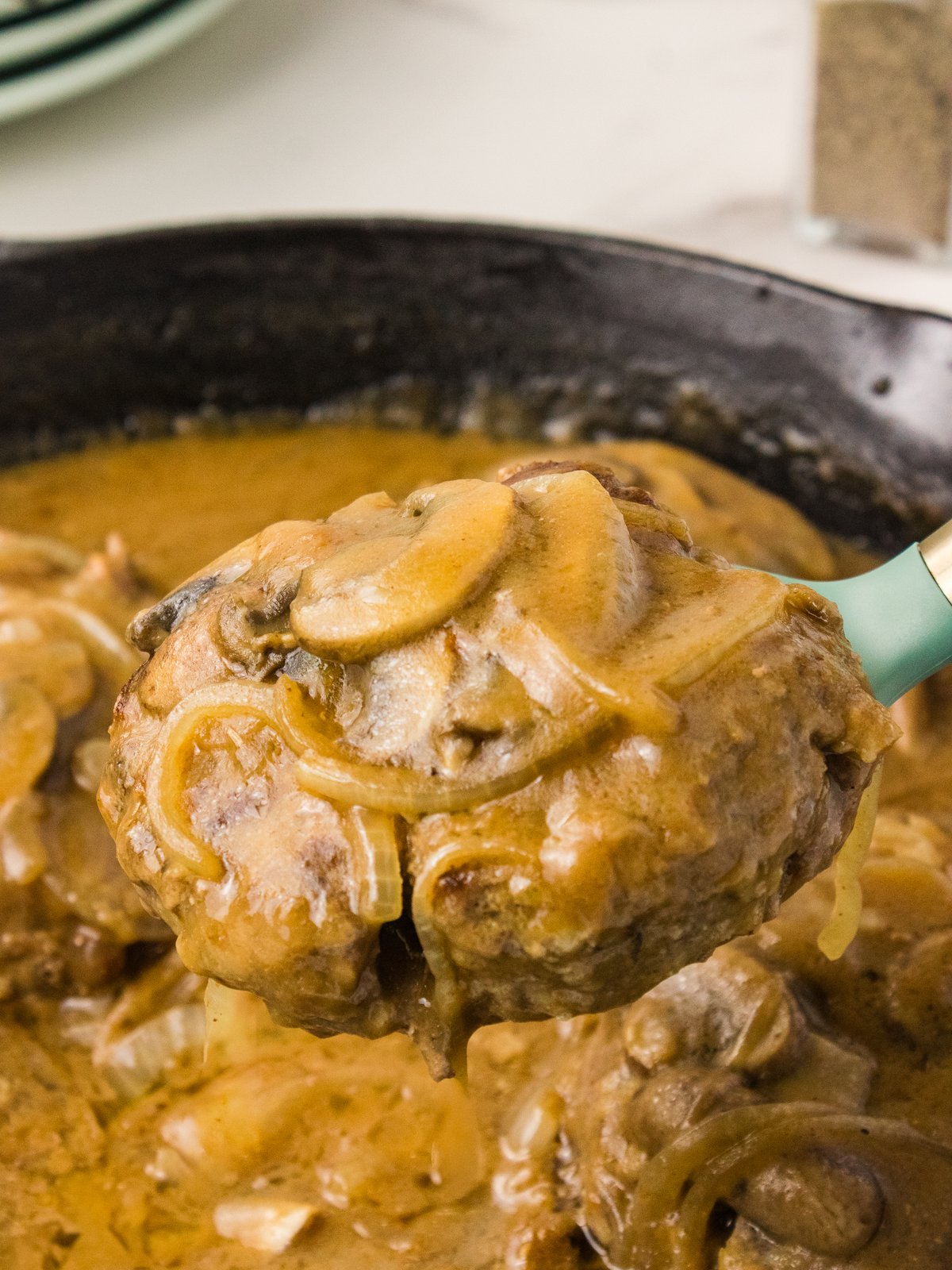 Hamburger steak with mushroom gravy close-up